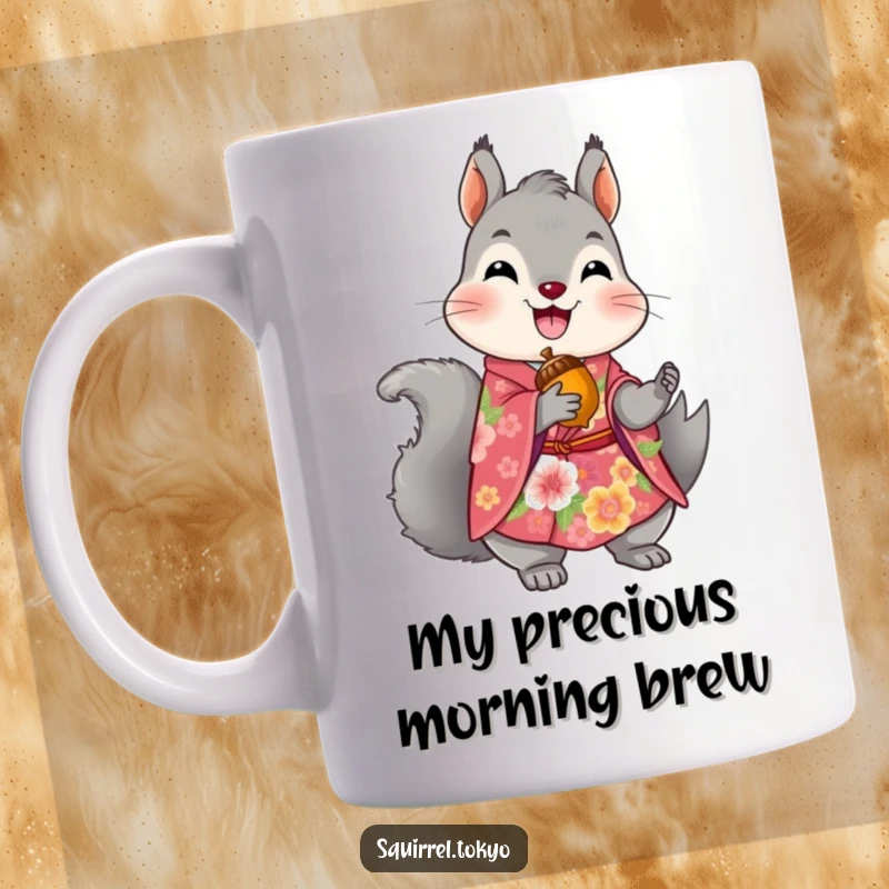 Funny mug featuring a delighted grey squirrel wearing a vibrant floral kimono, happily holding a shiny golden acorn.